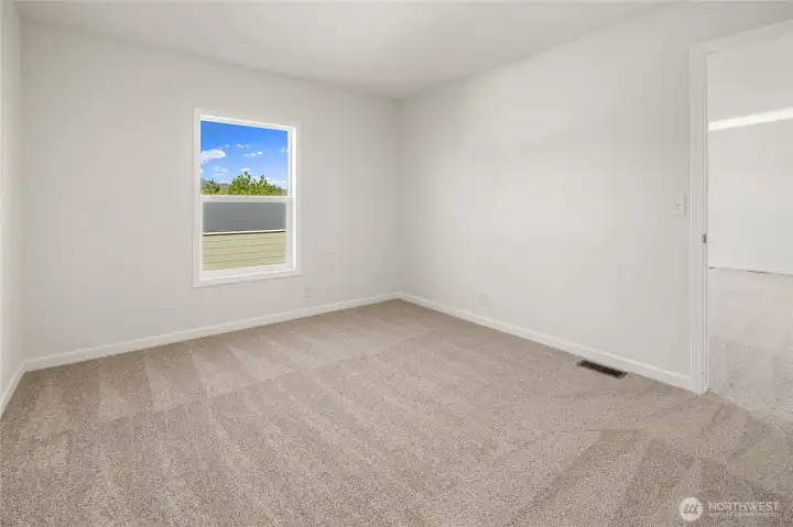 Bedroom off living room.