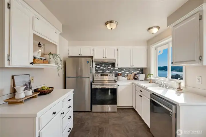 Refreshed cabinets for plenty of storage.