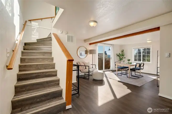 Sprial stairs lead you to generous multipurpose area