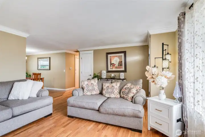Living room opens to dining and kitchen room area