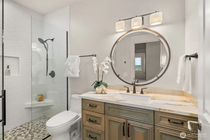 A curbless shower in the mother-in-law suite bathroom.