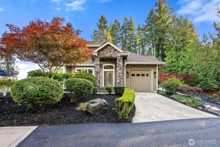 View from outside the attached multi-generational suite, complete with its own entrance, one-car garage, and laundry room.