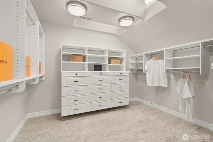 The primary suite closet and dressing room.