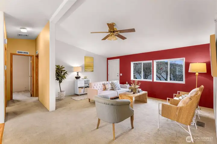 Big living room seen here (professionally staged, not just virtual, to show real furniture space).  Large windows look into a fruit tree grove!  Apples, etc...