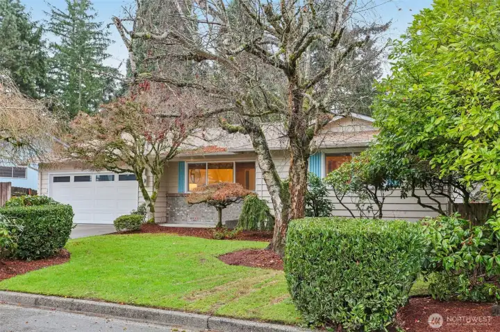 Lush mature landscaping surrounds this beautiful home with a versatile 2-bedroom ADU!