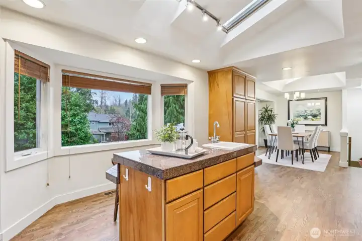 Large windows look out to your tranquil backyard and beautiful greenery.