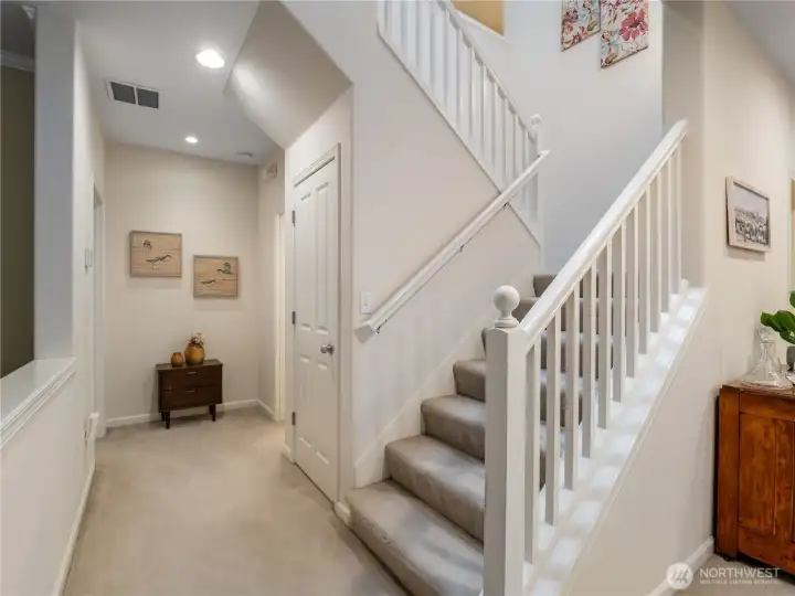 The hallway between the living area and the primary suite.