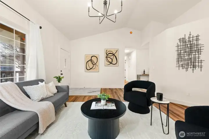 This view showcases the high ceiling and amazing angles that give the home character