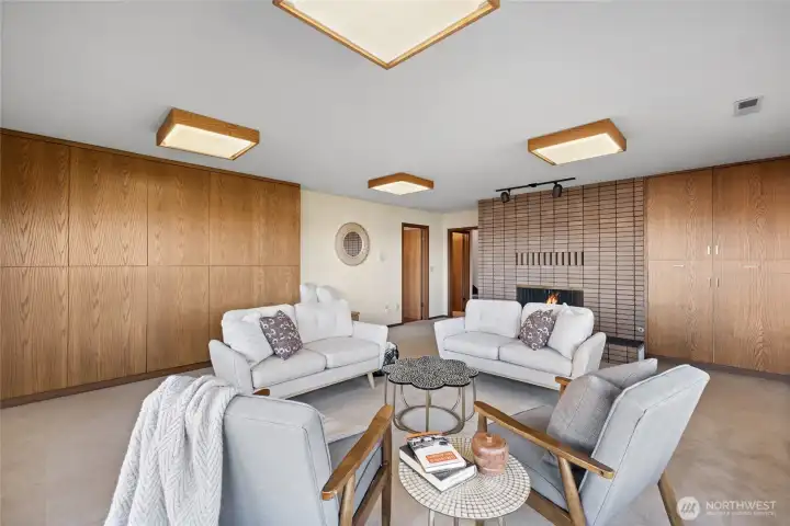 Family Room with a fireplace and more storage.