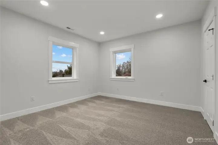 Bedroom #1 is closest to the stairs. New Carpet and Recessed Lighting!