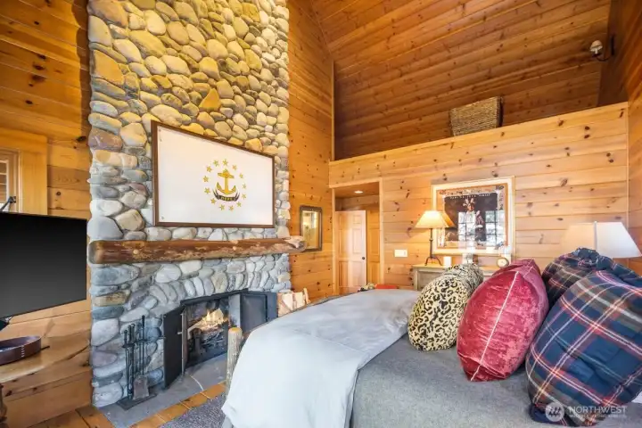 VERY COZY PRIMARY BEDROOM WITH FIREPLACE AND VAULTED CEILINGS