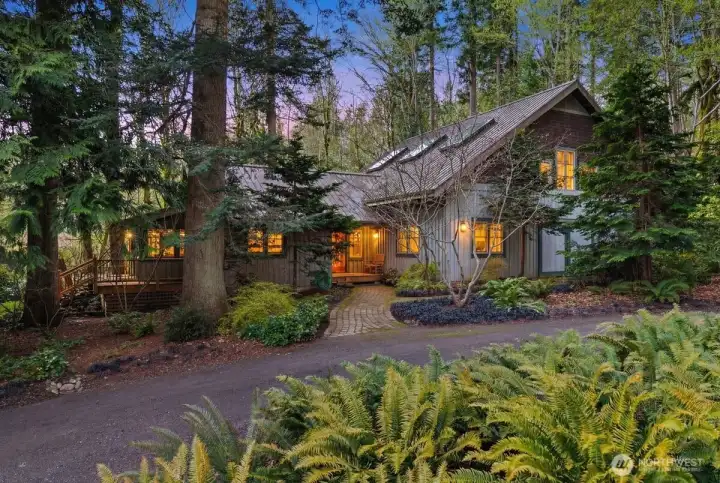 SEPARATE GUEST/ BUNKHOUSE AND GYMNASIUM WITH 1/2 COURT WOOD FLOOR BASKETBALL COURT AND HALF BATH