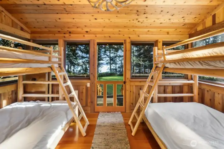 A CLASSIC SCREENED IN PORCH WITH BUNKBEDS
