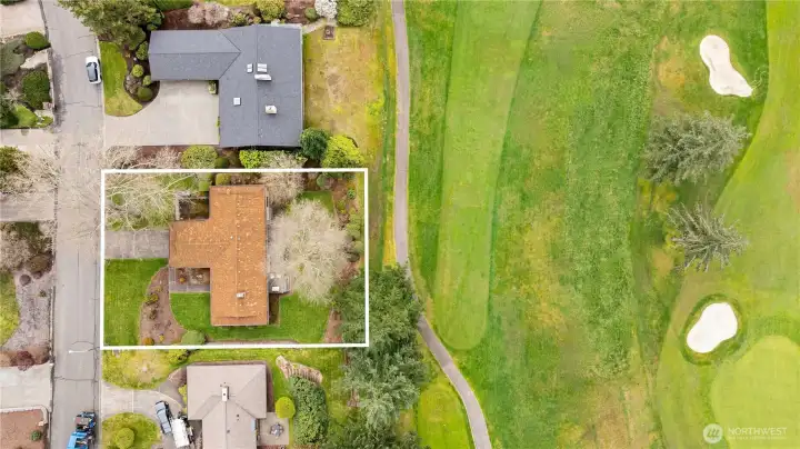 13,500 square foot level lot, with an evenly spaced yard in both the front and back.