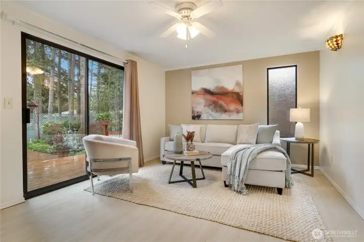 The eating area flows into an additional living area offering flexible use to fit your needs