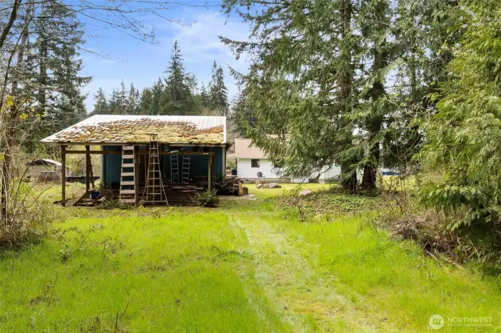 Covered area behind the shop.