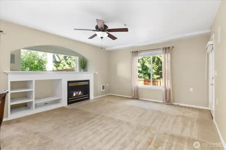 The thoughtful single-level layout enhances both comfort and functionality. [Fireplace shown with virtual flames for illustrative purposes only.]