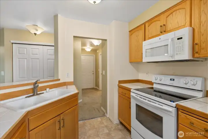 The open kitchen flows seamlessly into the main living area for easy everyday living.