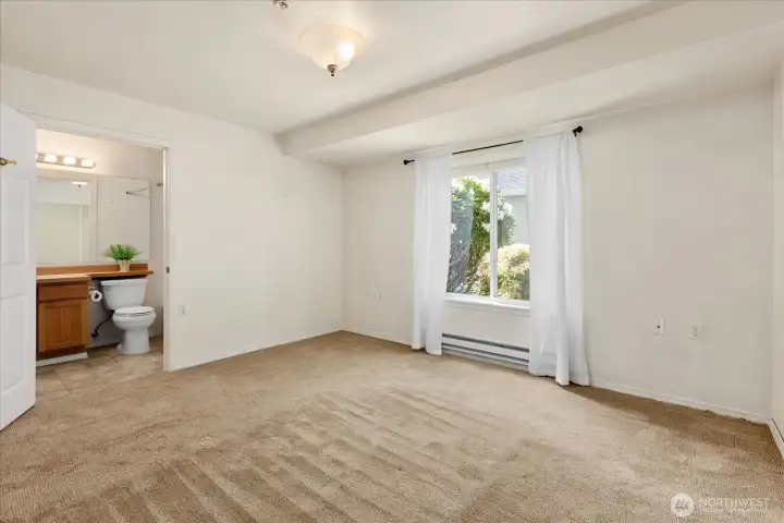 Convenient direct access to the full bathroom creates added privacy and functionality.
