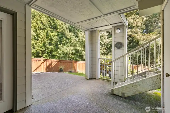 This peaceful outdoor retreat is perfect for morning coffee or evening unwinding.