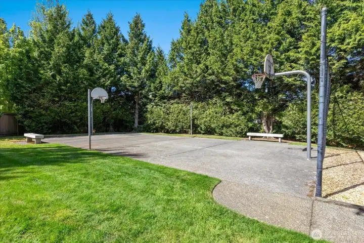 Community amenities include a neighborhood park and basketball court for recreation close to home.