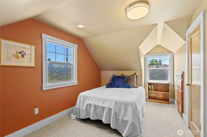 Upstairs: Bedroom 1: Built-In Dresser, Painted White Millwork and original hardwood door.