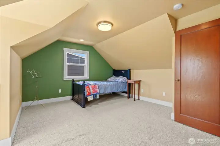 Upstairs:  Bedroom 2: White Painted Millwork, Original Hardwood Door. Next Photo is the same room.