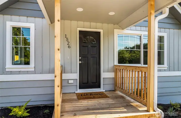 Brand new covered porch~ New windows~ Lighted and ready for new owners~