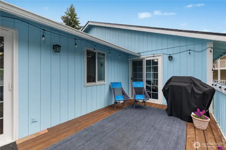 Spacious deck offers the perfect extension of the living space with room for grilling, dining, and relaxing outdoors Spacious deck offers the perfect extension of the living space with room for grilling, dining, and relaxing outdoors
