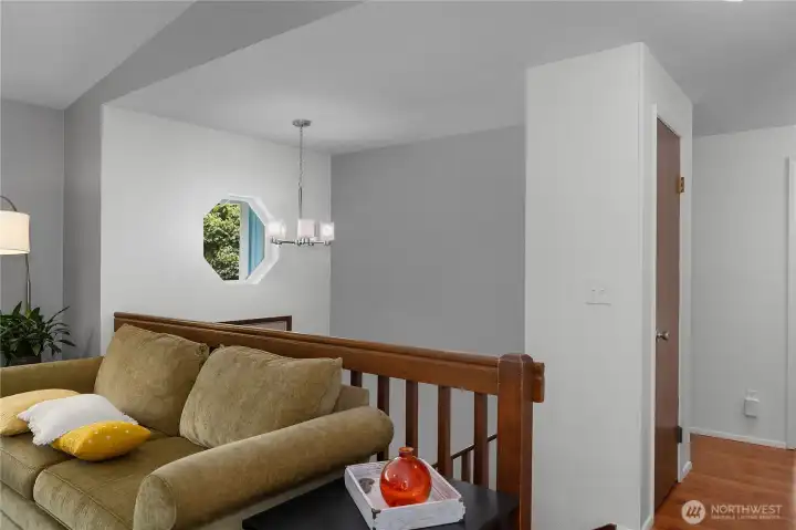 The split-level layout offers an open, connected feel while maintaining distinct living spaces The split-level layout offers an open, connected feel while maintaining distinct living spaces