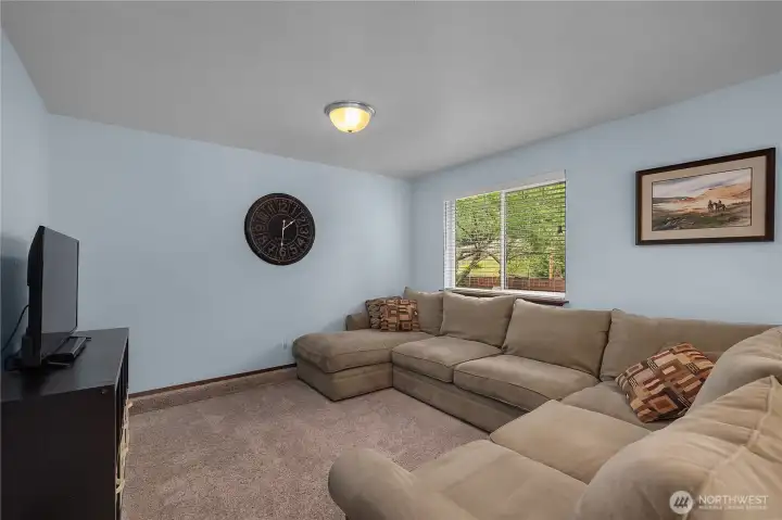 A generous second living area provides flexible space for entertainment, recreation, or a media room A generous second living area provides flexible space for entertainment, recreation, or a media room