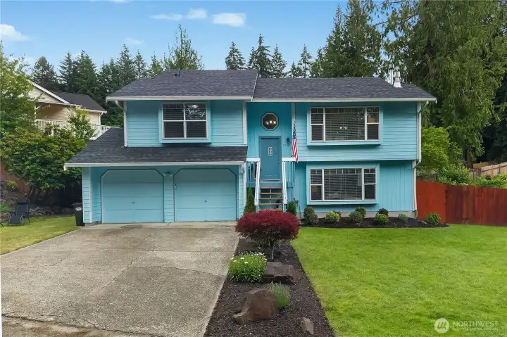 Situated on a quiet neighborhood street, this attractive split-level home offers ample parking, mature landscaping, and timeless curb appeal Situated on a quiet neighborhood street, this attractive split-level home offers ample parking, mature landscaping, and timeless curb appeal