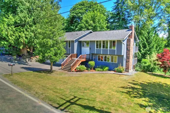 Front if the home with yard