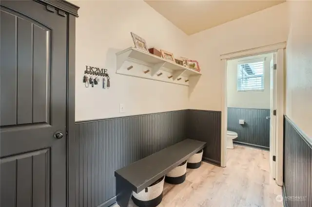 Lower mud room just of the garage. Modern Powder room