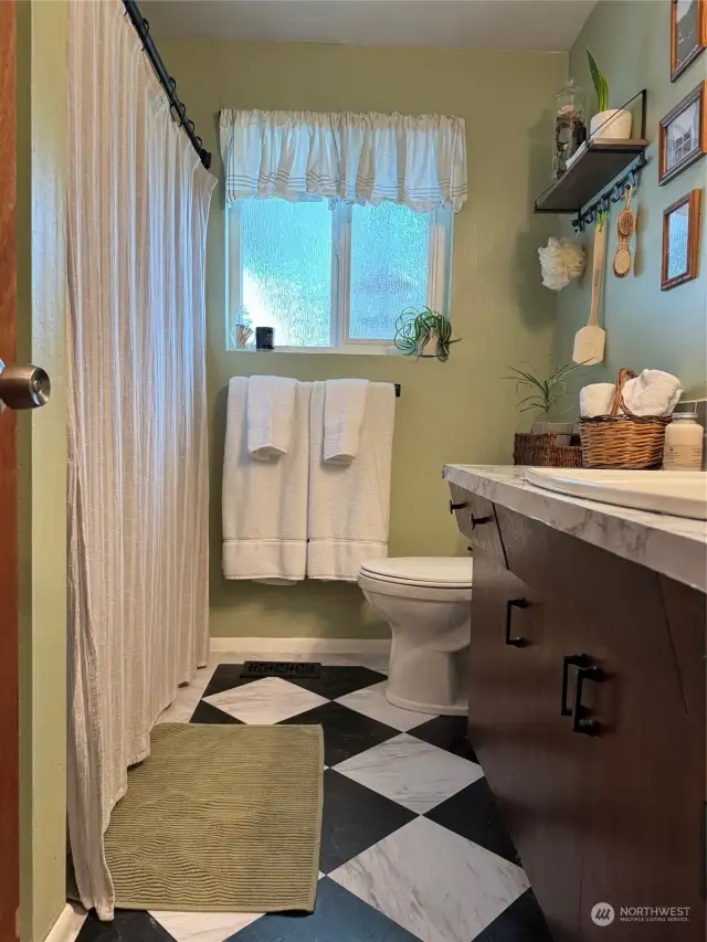 Main Bathroom has a Shower over the Tub