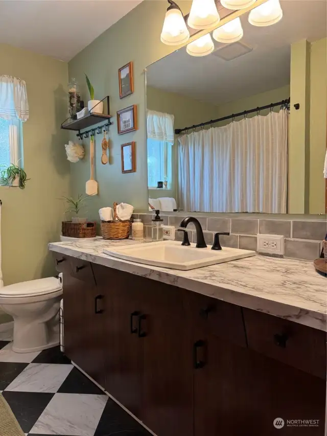 Main Bathroom has a Shower over the Tub