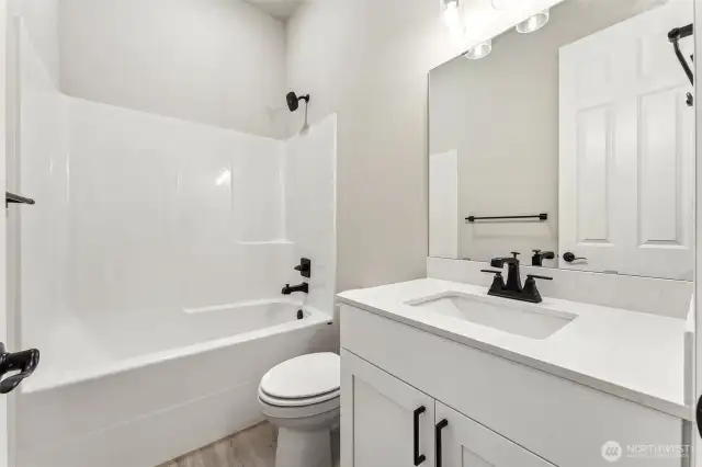Photos are of a similar home with same floorplan.