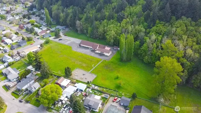Aerial of 3 parcel, parcel 1 has playground, parcel 2 has Church and parking lot, parcel 3 is largest and connects to Seminary Hill (nature trails)