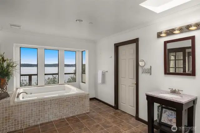Relax in the primary bath and enjoy the views