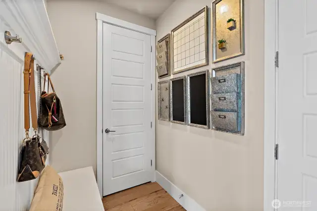 drop zone with extra coat closet. 8' doors throughout