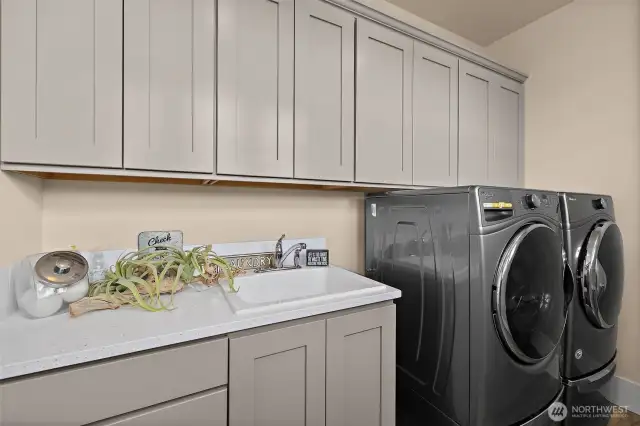 drop zone with extra coat closet. 8' doors throughout