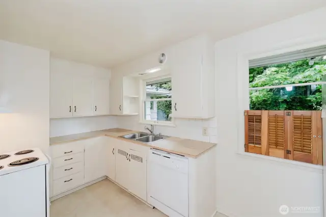 Step into a charming kitchen that blends simplicity with functionality.