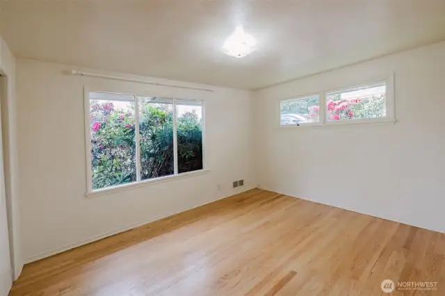 generously sized and features beautiful, well-maintained hardwood floors
