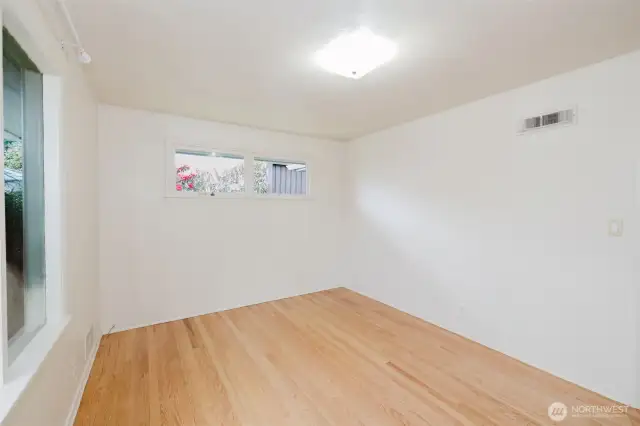 generously sized and features beautiful, well-maintained hardwood floors