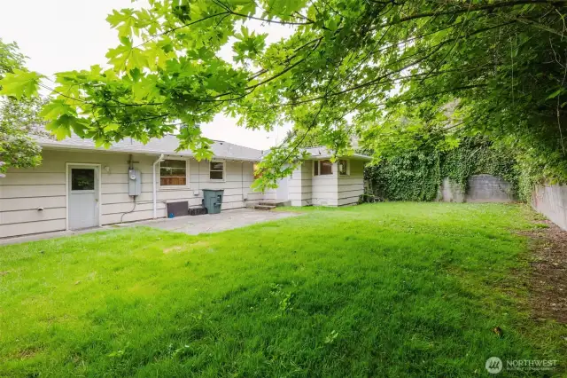 Whether you’re seeking a safe play space or a gardener’s paradise, this yard has it all.