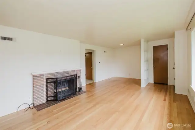charming brick fireplace adds warmth and character