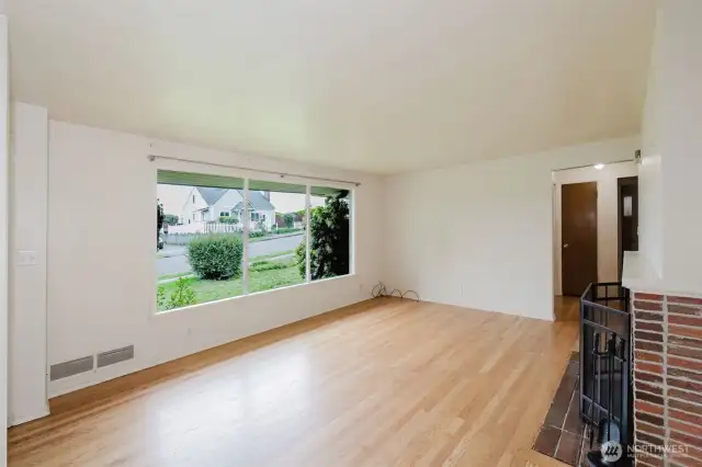 Clean lines, neutral tones, and mid-century touches make this space easy to personalize.