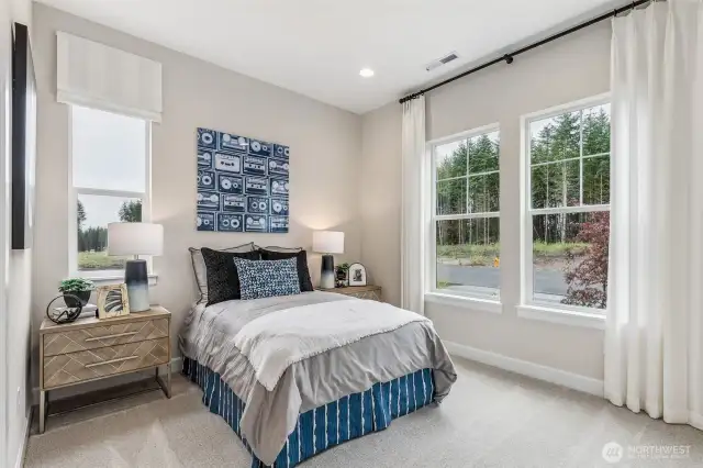Photos are of the Darius Model Home on Lot 2