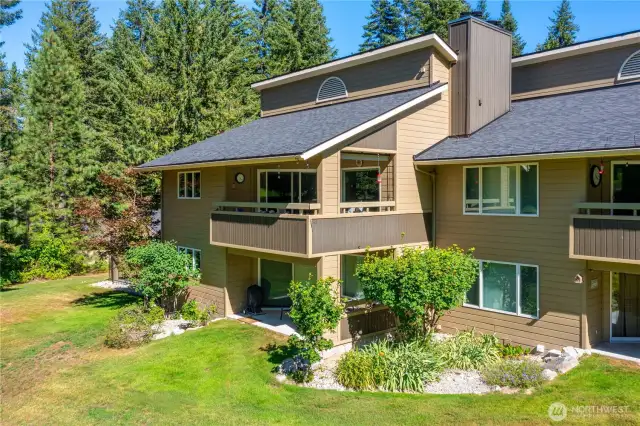 This 2nd floor end unit offers privacy from the covered deck.