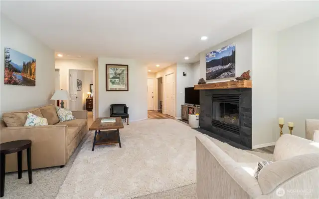 Looking back: The hall on the left takes you to the primary suite and guest bed and bath.
